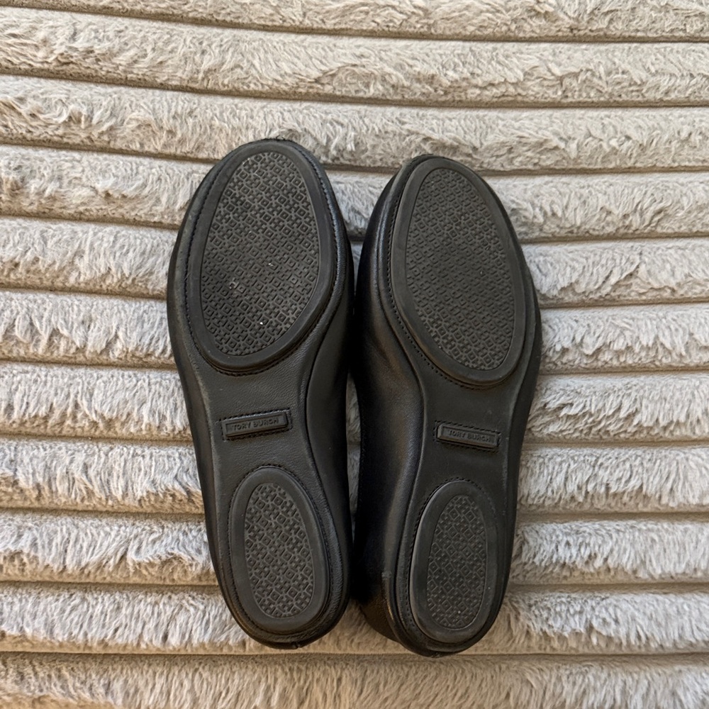 Tory Burch Black Flats with Gold Emblem - Picture 2 of 4